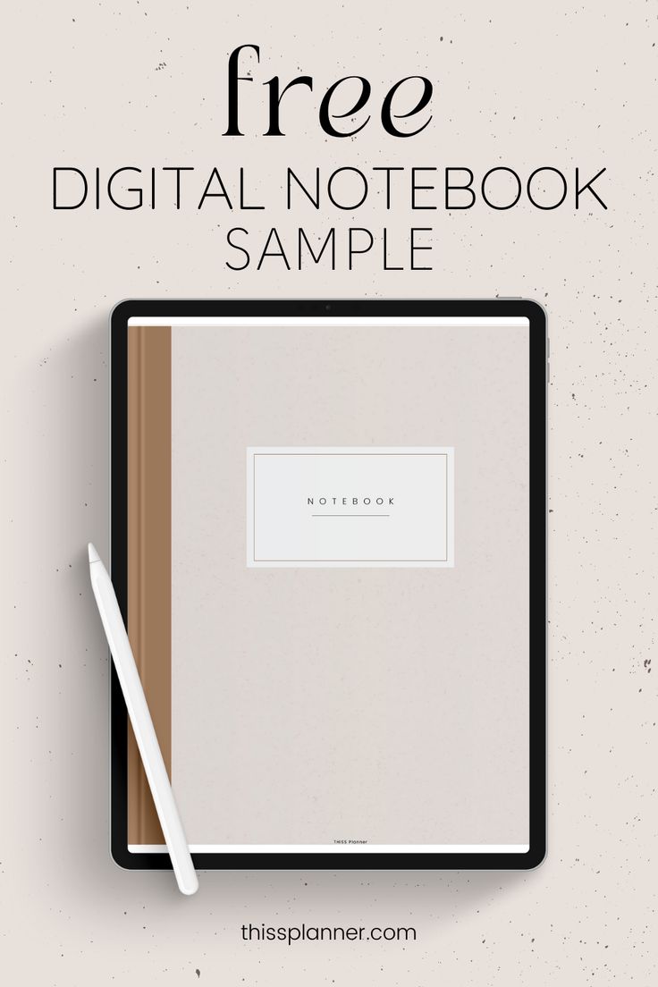 the free digital notebook sample is shown with a pen and paper on top of it