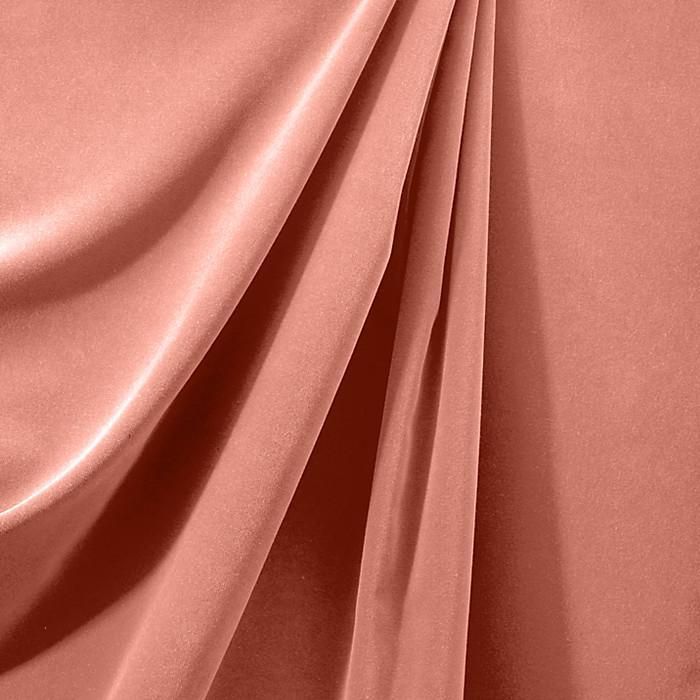 a close up view of a pink satin fabric