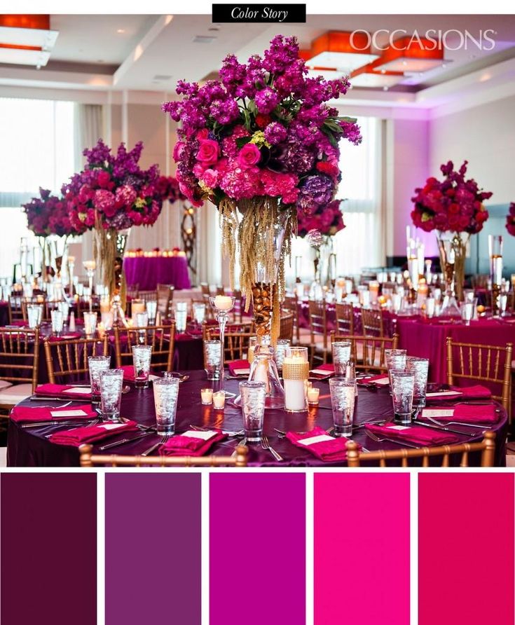 a table with purple and pink flowers in vases, candles and glasses on it