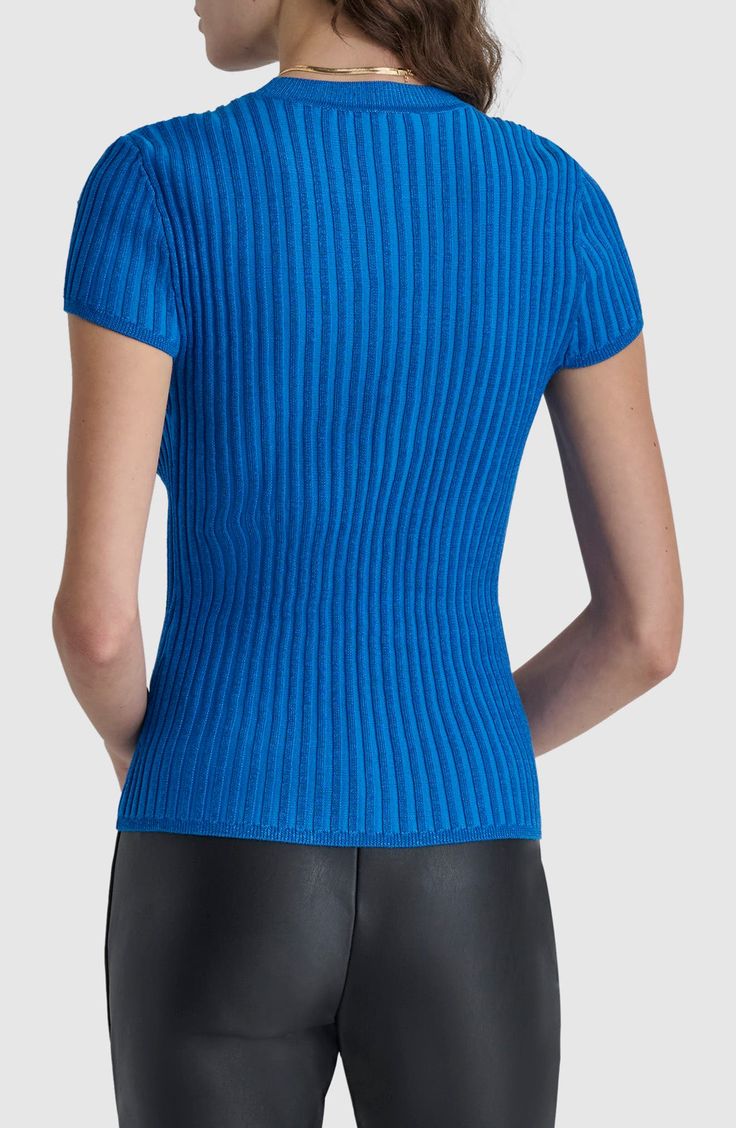 Raised stitches merge and create textural stripes on an eye-catching sweater knit with short sleeves for year-round wear. Crewneck Short sleeves 80% rayon, 20% nylon Machine wash, dry flat Imported Blue Short Sleeve Top With Ribbed Collar, Blue Short Sleeve Tops With Ribbed Collar, Blue Pointelle Knit Crew Neck Top, Blue Jacquard Knit Tops, Blue Knit Crew Neck Top, Short Sleeve Knit Sweater With Ribbed Collar, Fitted Short Sleeve Pointelle Knit Sweater, Knit Sweater With Ribbed Collar And Short Sleeves, Blue Short Sleeve Knit Top