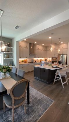 a dining room table and chairs in a kitchen