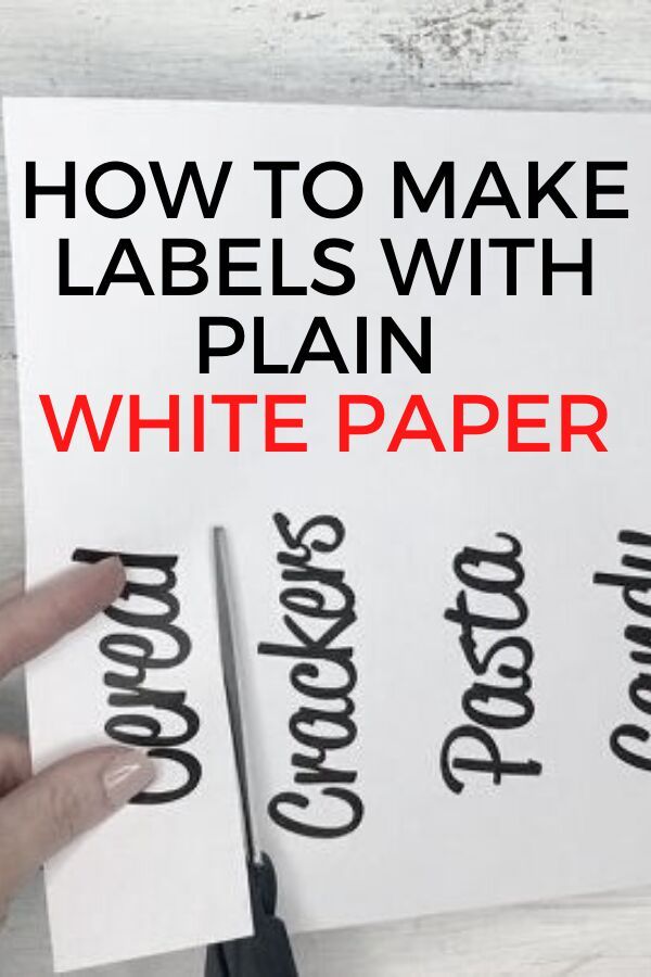 a person holding a piece of paper that says how to make labels with plain white paper