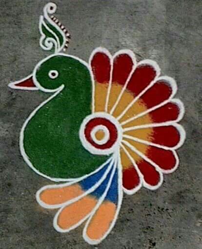 a colorful peacock painted on the ground