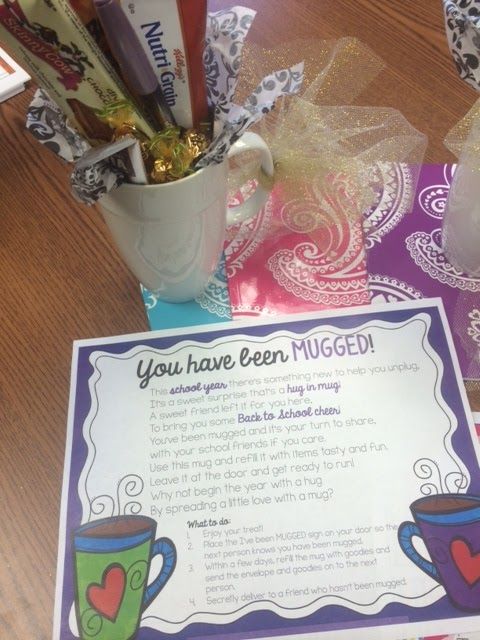 a table topped with lots of candy and cards