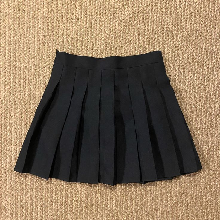 Black Pleated Mini Skirt Never Worn Size Medium In Perfect Condition Cheap Gray Mini Skirt For Summer, Black Pleated Tennis Skirt For Summer, Black Pleated Skort For Summer, Summer Black Pleated Skort, Chic Black Pleated Tennis Skirt, Black Pleated Mini Tennis Skirt, Casual Black Pleated Tennis Skirt, Black Tennis Skirt For Spring, Chic High Waist Black Tennis Skirt