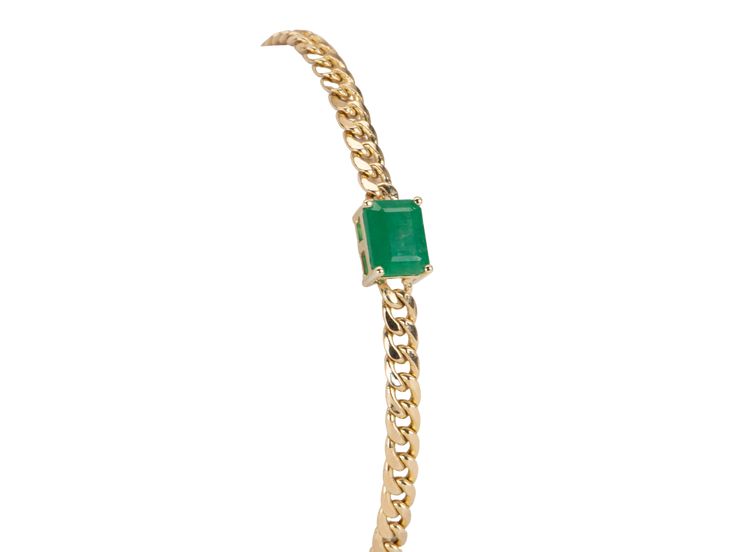 ♥ A 14K gold Miami Cuban link chain bracelet with a stunning Zambian emerald pendant in the center ♥ The emerald measures 8mm in width, 6mm in length, and sits 5mm thick ♥ The bracelet is 6" in length with an 1" extension chain for adjustment ♥ The Miami Cuban link chain is 3.5mm wide ♥ Material: 14K gold ♥ Gemstones: Zambian emerald, 1.7ct ♥ All gemstones used are genuine, earth-mined, and guaranteed conflict-free! Green Link Chain Jewelry, Green Formal Jewelry Chain, Formal Green Chain Jewelry, Emerald Chain Jewelry As A Gift, Emerald Chain Jewelry For Gift, Green Oval Link Classic Jewelry, Classic Green Oval Link Jewelry, Elegant Green Jewelry With Box Chain, Green Chain Bracelet Jewelry