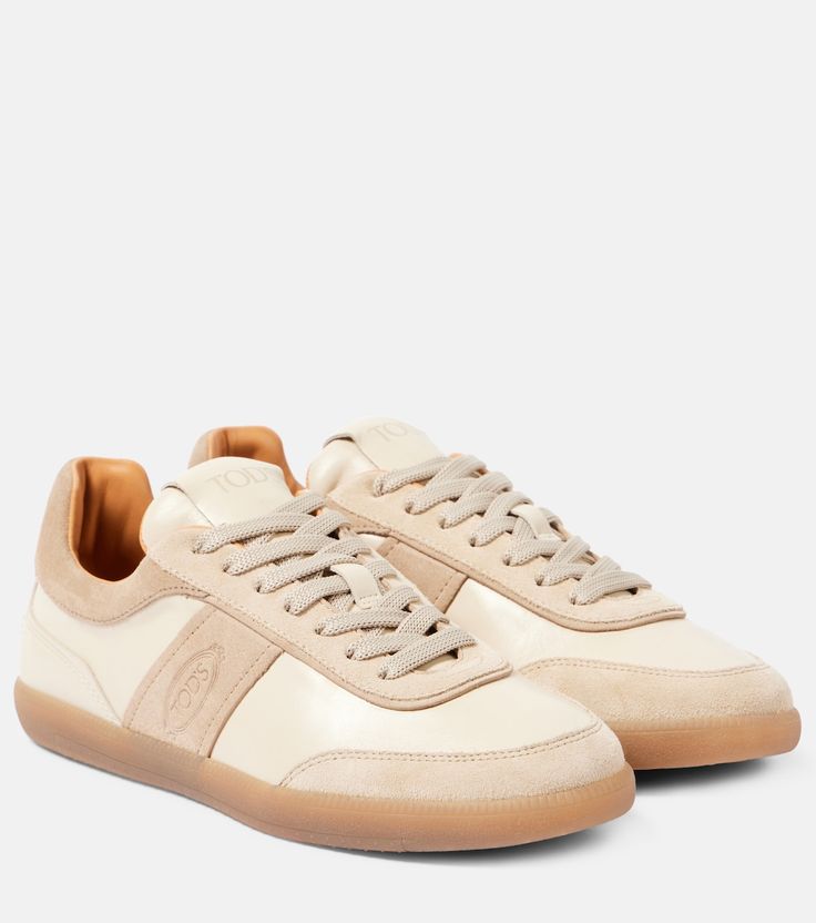 Cream Lace-up Calf Leather Sneakers, Cream Calf Leather Sneakers With Textured Sole, Classic Beige Sneakers With Stitched Sole, Beige Calf Leather Sneakers With Rubber Sole, Sporty Cream Sneakers In Calf Leather, Sporty Cream Calf Leather Sneakers, Cream Suede Sneakers With Rubber Sole, Classic Beige Sneakers With Leather Sole, Cream Low-top Sneakers With Leather Sole