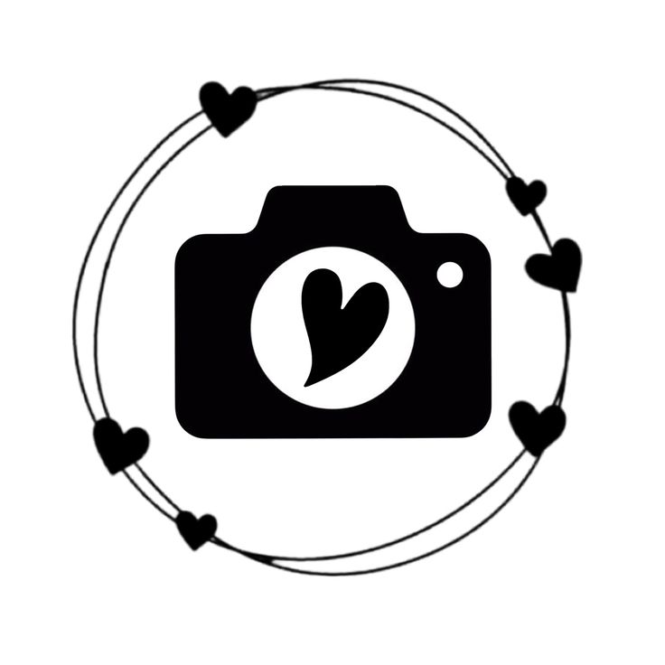 a camera with hearts around it