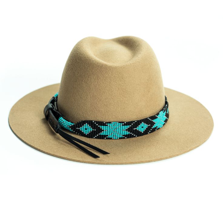 Price includes a Lola Sambboho hat & a Saint Barth hat band. Save 10% with this bundle. Select hat size. Hatband is one size fits all. Hatband is removable.  An iconic must-have Fedora hat that will never get out of fashion. Sambboho's Lola hat has a soft brim and indented crown. A chic piece to be worn at all seas Bohemian Panama Hat With Short Brim For Ranch, Bohemian Short Brim Panama Hat For Ranch, Bohemian Brimmed Panama Hat For Ranch, Bohemian Adjustable Panama Hat For Ranch, Bohemian Panama Hat With Flat Brim For Ranch, Bohemian Flat Brim Panama Hat For Ranch, Southwestern Straw Hat With Short Brim For Festival, Southwestern Style Straw Hat With Short Brim For Festivals, Adjustable Bohemian Hat Band For Vacation