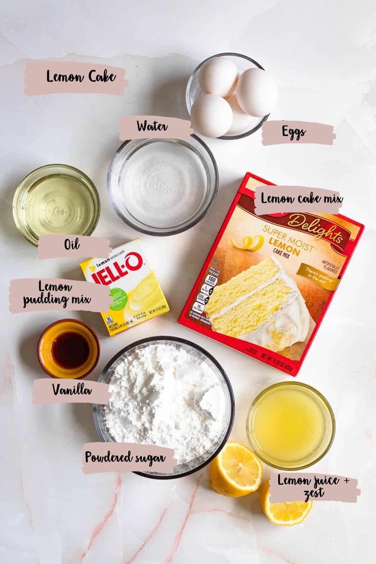 ingredients to make lemon cake laid out on a table