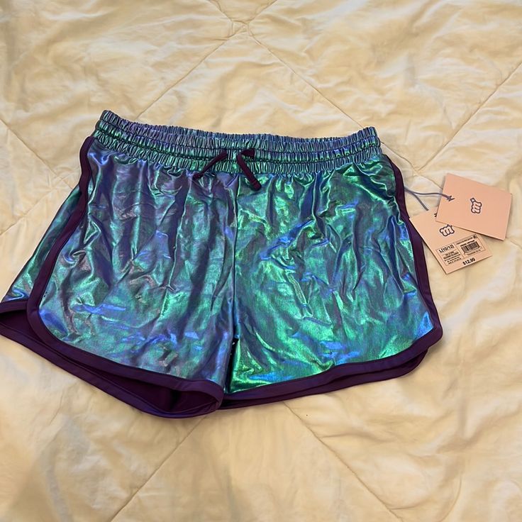 More Than Magic Blue/Purple Metallic Shorts With Adjustable Drawstrings. Nwt Casual Purple Playwear Bottoms, Casual Purple Bottoms For Playwear, Purple Bottoms For Playwear In Spring, Trendy Stretch Purple Shorts, Galaxy Shorts, Gymnastics Shorts, Aqua Mermaid, Mermaid Shorts, Sparkle Shorts