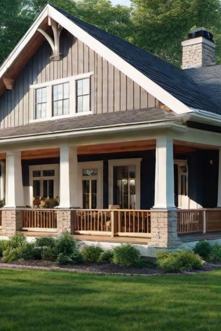 A charming two-story house with a front porch, gray siding, and stone accents, surrounded by a well-manicured lawn. Cottage Farmhouse Exterior, Modern Farmhouse Bungalow, Gables On House Exterior, Craftsman Farmhouse Exterior, Rustic Cabin Exterior, Farmhouse Exterior Paint Colors, Craftsman House Exterior, Farmhouse Craftsman, Farmhouse Exterior Design