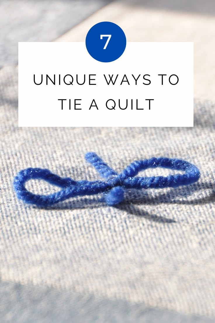 a blue knot on top of a piece of cloth with text overlay that reads 7 unique ways to tie a quilt