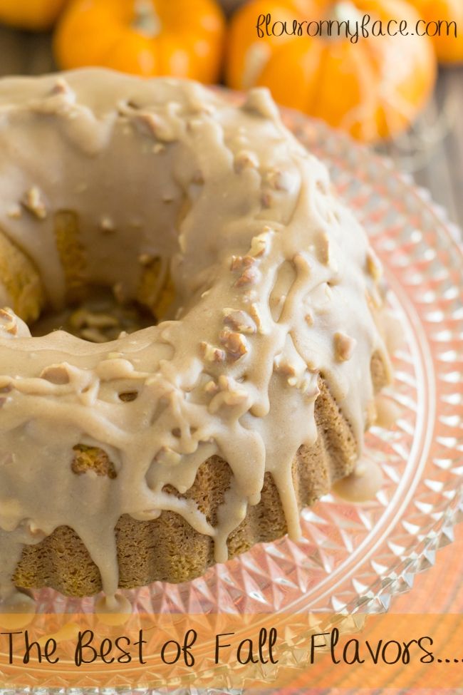 a bundt cake with icing on a plate