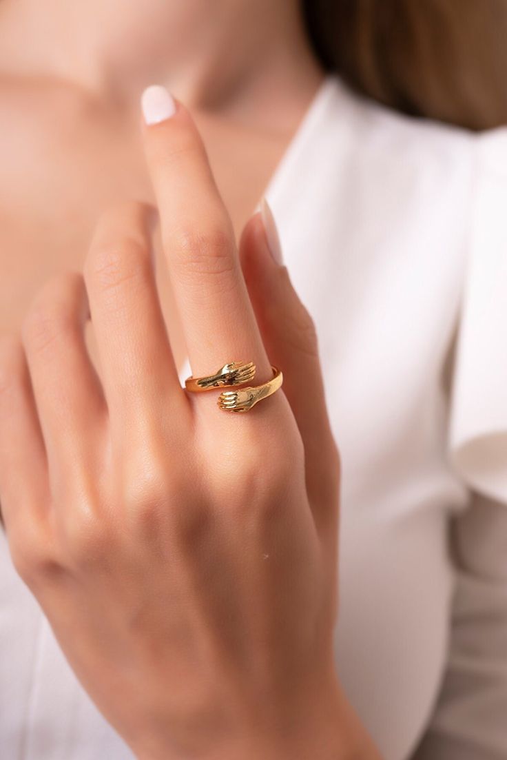 14k Gold Hands Rings, Love Hugging Hand Stackable Ring, Love Hug Ring, Couple Ring, Lover Rings,Hug Ring, Engagement Ring, Wedding Ring, Product Details ✪ Handmade / Handcrafted Fine Jewelry ✪ Gold Weight: Approx. 2.5g (Based on size 6) ✪ Metal: 14K Solid Gold ✪ Band Width: ✪ Gold Color: White gold, Rose gold, Yellow gold ♡ For questions or special designs, please contact us via message. We are happy to hear from our customers and always respond quickly. Comments are always valuable. 🎁 TRANSPOR Rose Gold Promise Couple Rings With Open Design, Promise Rose Gold Couple Rings With Open Design, Rose Gold Open Couple Rings For Promise, Wedding Birthstone Ring With Polished Finish, Wedding Birthstone Ring With Polished Round Cut, Solitaire 14k Gold Bypass Promise Ring, 14k Gold Solitaire Bypass Promise Ring, Yellow Gold Jewelry With Tension Setting For Promise, 14k Gold Tension Setting Anniversary Rings