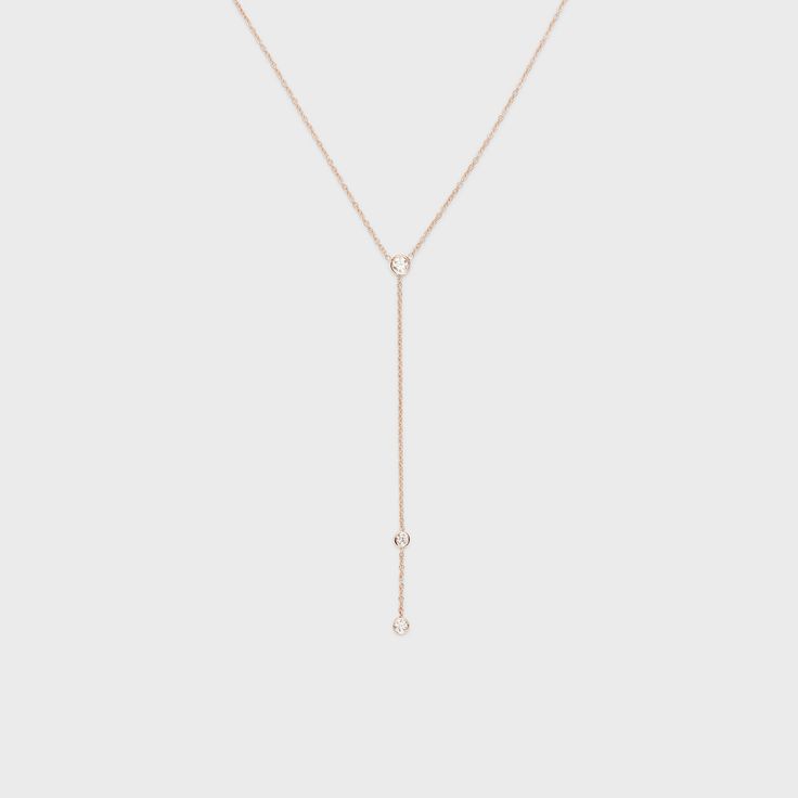 The perfect piece to add elegance and a feminine touch to any outfit! G-H color, VS clarity, 0.20ctw Adjustable chain length with 3" drop Elegant Formal Diamond Necklace With Adjustable Chain, Adjustable Rose Gold Dainty Lariat Necklace, Adjustable Dainty Rose Gold Lariat Necklace, Dainty Adjustable Rose Gold Lariat Necklace, Elegant Diamond Drop Necklace, Dainty Rose Gold Lariat Necklace, Luxury Rose Gold Jewelry With Adjustable Chain, Formal Rose Gold Necklace With Adjustable Chain, Elegant Lariat Clavicle Chain Jewelry