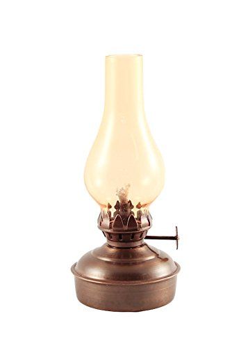 an old fashioned oil lamp on a white background