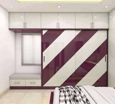 a bedroom with white and red striped walls, cabinets and a bed in the middle