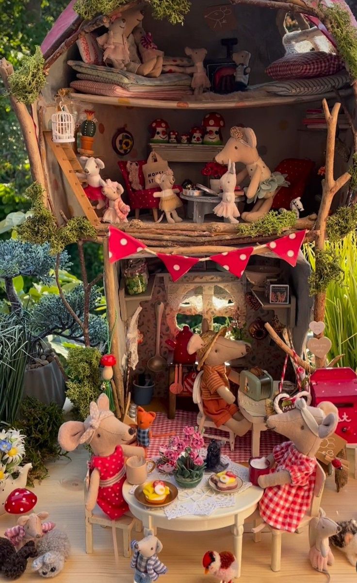 a doll house with lots of toys in it