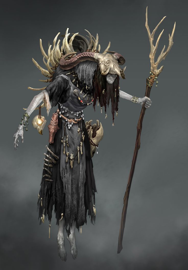 an image of a demon with horns holding a stick and wearing a horned headdress