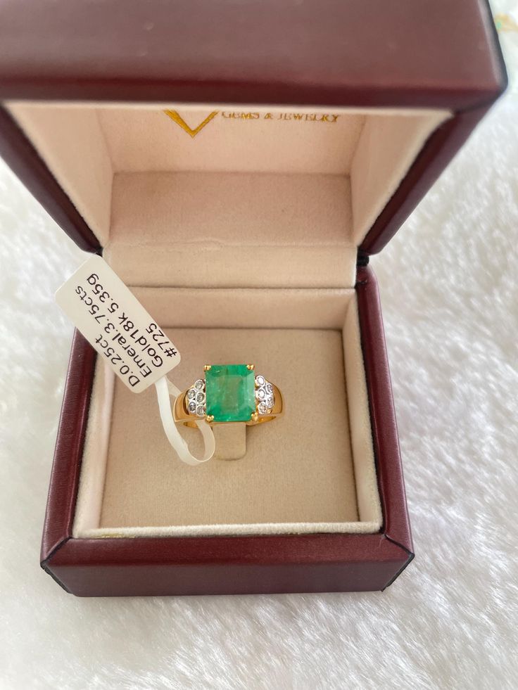 This stunning ring features a beautiful emerald-cut Colombian gemstone set in 14k yellow gold. The vintage piece is handmade and comes with a seller warranty. It is also sizable and can be personalized with a message or a name. The ring has a total carat weight of 4.00 ct and features 10 diamonds with a G color grade and a very slightly included (VS1) clarity grade.  The ring is perfect for anyone who loves fine jewelry and wants a unique piece to add to their collection. It is available in ring size 7.5 and comes with engraving options. The metal color change is available in white, yellow, rose, and black. Please send us a message on Etsy if you have any questions about this beautiful ring. Gold Rectangular Emerald Ring For May Birthstone, 14k Gold Emerald Ring Radiant Cut, 14k Gold Emerald Ring Radiant Cut For Gift, 14k Gold Radiant Cut Emerald Ring Gift, Radiant Cut Emerald Ring In 14k Gold, May Birthstone Princess Cut Emerald Ring In Yellow Gold, Yellow Gold Radiant Cut May Birthstone Ring, Yellow Gold Radiant Cut Ring For May Birthstone, Gold Emerald Ring With Radiant Cut Center Stone