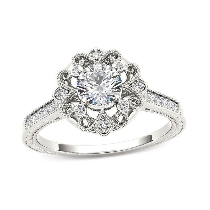 a white gold engagement ring with diamonds