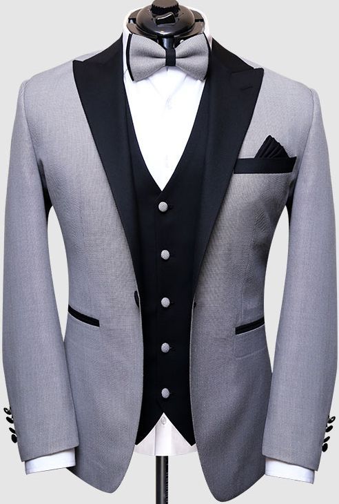 Men Silver Tuxedo Suit with black satin shawl lapel. This fashionable tuxedo jacket is made of an Italian fabric that looks and feels like super 100 wool. This tuxedo suit is perfect for a wedding or party wear. Gray Tuxedo Suit For Formal Occasions, Winter Black Tie Tuxedo Suits, Tailored Gray Tuxedo For Formal Occasions, Gray Tuxedo Blazer With Notch Lapel, Semi-formal Gray Tuxedo With Notch Lapel, Winter Black Tie Tuxedo With Notch Lapel, Gray Notch Lapel Tuxedo For Semi-formal Occasions, Gray Notch Lapel Tuxedo For Semi-formal Events, Gray Tuxedo With Suit Collar For Wedding