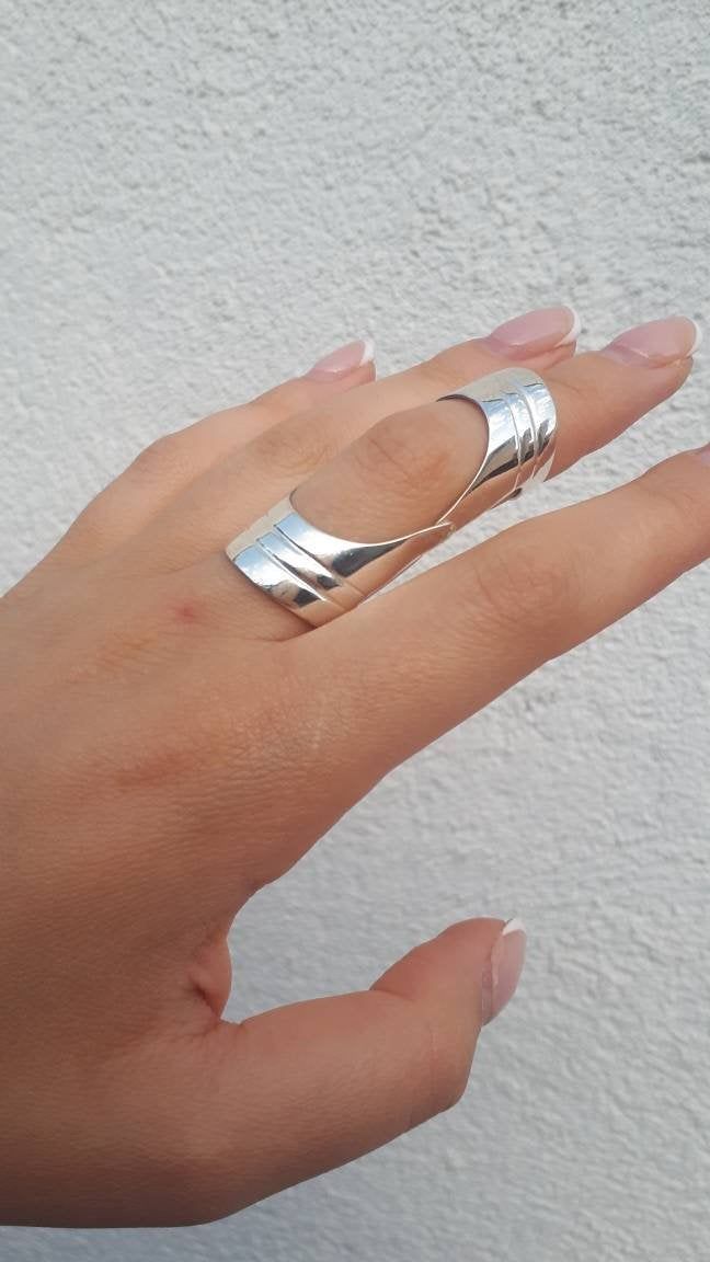 Armor rings Shield ring Double ring Joint ring Knuckle ring Statement ring Full finger ring Armenian silver Ring Large Ring Unique Ring NOTE. Please choose your exact size , as the band is wide we make it a bit larger More armor rings check out here https://www.etsy.com/listing/823916704/armor-full-finger-ring-shield-ring?ga_search_query=full%2Bfinger&ref=shop_items_search_1&pro=1&frs=1 https://www.etsy.com/listing/779039553/full-finger-ring-double-ring-shield-ring?ref=shop_home_acti Silver Open Midi Rings Stamped 925, Handmade Silver Open Band Midi Rings, Handmade Silver Midi Rings With Open Band, Sterling Silver Open Band Midi Rings, Silver Open Midi Rings, Silver Crystal Open Ring, Sterling Silver Wide Open Band Ring, Sterling Silver Open Wide Band Ring, Minimalist Metal Toe Ring