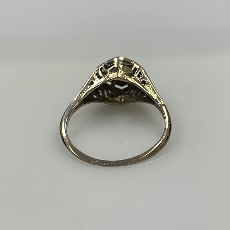 *PRE-OWNED LIKE NEW* COMPLIMENTARY RING SIZING - MESSAGE US FOR DETAILS ON SIZING This spectacular antique ring in 14k yellow gold holds in it's center what is known as a Transitional Cut diamond. Old fashion in its looks, this diamond is a treasure to find. It is set in bezel fashion with a unique hexagonal molding and design creating the look of this one of a kind ring. Ring Details: 14k yellow gold Transitional Cut Diamond 0.30 ctw Diamond Color H - Clarity SI2 US Womans Size 7.0 Classic Domed Yellow Gold Sapphire Ring, Classic Yellow Gold Domed Sapphire Ring, Vintage 14k Stamped Sapphire Ring For Formal Occasions, Collectible Heirloom Solitaire Ring, Classic Domed 14k Stamped Rings, Vintage White Gold Signet Ring With Center Stone, Classic Diamond Signet Ring Collectible, Classic 14k Gold Engraved Ring With Intricate Design, Classic Intricate 14k Gold Jewelry