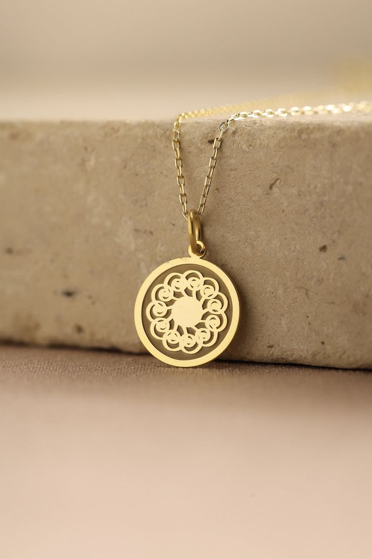 Gold Sun Pendant - Sun Gold Necklace ● Material of pendant: Solid Gold 14k ( REAL GOLD ) ● Metal Stamp: 14k ( REAL GOLD ) ● The pendant is available in 5 sizes: - 12,7 mm / 0.5 inches (Diameter) - 14,0 mm / 0,55 inches ( Diameter ) In the photos - 15,3 mm / 0.6 inches ( Diameter ) - 16,5 mm / 0,65 inches ( Diameter ) - 19,1 mm / 0,75 inches ( Diameter ) ( In the photos the size is 14mm / 0.55 inches Diameter ) ( Jump Ring inner diameter: 4 mm ) ● Material of chain: Solid gold 14k ( REAL GOLD ) I 14k Gold Medallion Jewelry Gift, Yellow Gold Filigree Flower Pendant Jewelry, Spiritual Round Filigree Necklace, Delicate Engraved Yellow Gold Jewelry, 14k Gold Charm Necklace With Round Pendant For Her, Yellow Gold Medallion Jewelry Gift, 14k Gold Filigree Pendant Necklace, Gold Plated Filigree Jewelry As Gift, Yellow Gold Flower Pendant Jewelry As Gift For Her