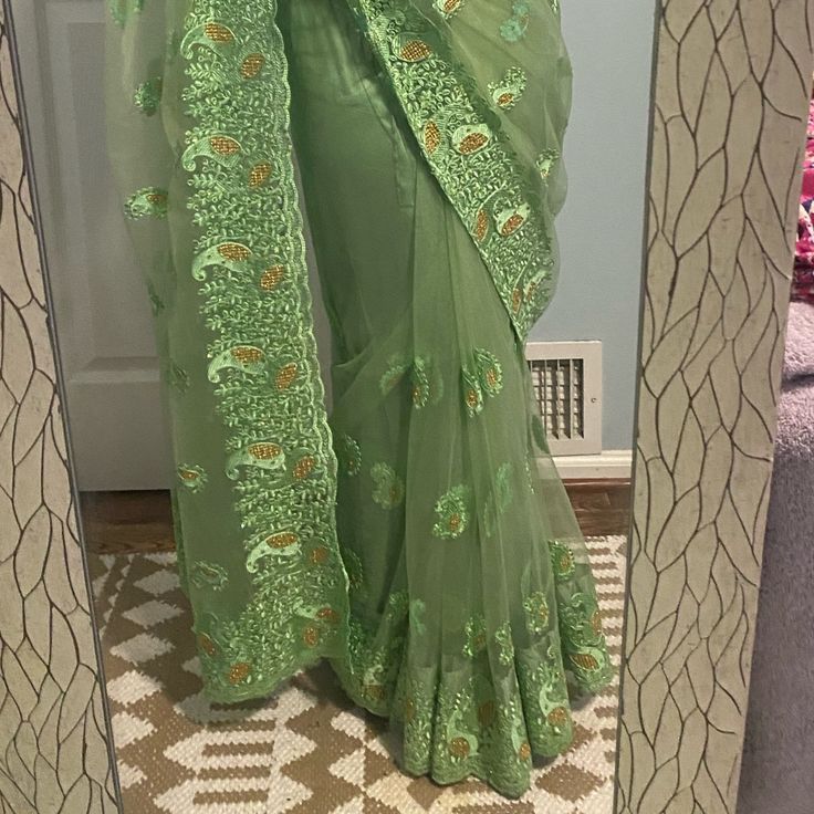 Worn Once Comes With Gold Stretchy Blouse For Xs Petite Person. Fitted Green Saree For Party, Green Organza Blouse Piece For Wedding, Green Fitted Pre-draped Saree With Cutdana, Green Organza Wedding Blouse Piece, Wedding Green Organza Blouse Piece, Festive Green Fitted Pre-draped Saree, Fitted Green Saree With Dori Work, Elegant Green Embroidered Saree, Elegant Green Pre-draped Saree With Dori Work