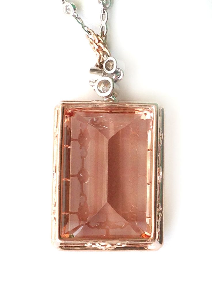 Lovely gemstone set in rose gold, this 44.03 carat mystical Morganites add a touch of fresh sexiness to this pendant. Set in 14K gold, there will be no denying the durability of this pendant paired with the everlasting salmon colored beryl. Although cousin to the Emerald, Morganites are very different and are exceptionally clear making this gem a treat to look at. Paired with diamonds upon an intricate gold mesh, this pendant will be eternally trendy. 
PCK20313-MORG
#384992 Rose Gold Pendant, Salmon Color, Pendant Set, Morganite, Gold Pendant, Types Of Metal, Emerald, Diamonds, Gems