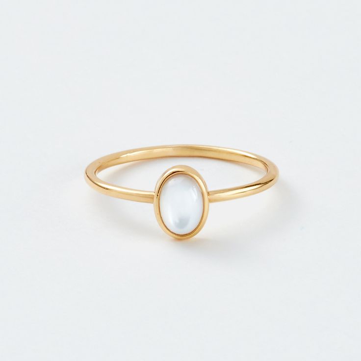 A small, delicate Gold Small Oval Pearl Ring is a delightful, feminine choice. Crafted from eco-friendly recycled gold and a sustainable gemstone, it is the perfect accessory to pair with any Sara Patino Jewelry look. The soft and luminous white pearl offers a timeless beauty that is both classic and modern. Recycled 14k gold filled Mother of Pearl is 6mm x 4mm Elegant Oval Stackable Rings For Everyday, Elegant Stackable Rings For Everyday, Elegant Everyday Stackable Oval Rings, White Oval Pearl Ring In 14k Gold, White Oval Moonstone Ring In Minimalist Style, Elegant Everyday Open Moonstone Ring, Gold Minimalist Oval Pearl Ring, Minimalist Gold Oval Pearl Ring, Elegant Everyday Moonstone Ring