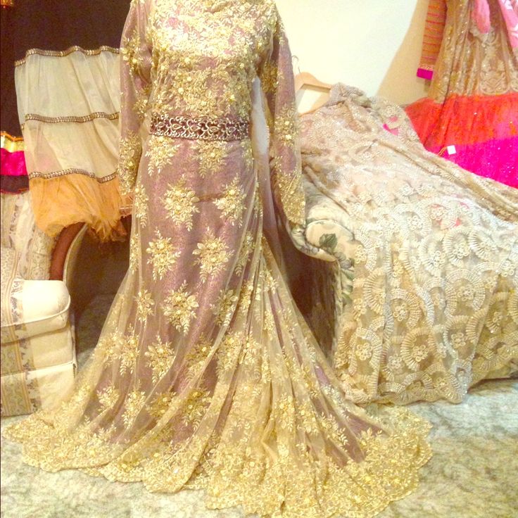 Buy This Gold Dress Or Custom Make Your Dress And Include Your Target Price Range! Customer Satisfaction Guaranteed | Minimum Order Price: $300 Gold Long Sleeve Gown For Reception, Gold Anarkali Maxi Dress, Gold Maxi Length Dress With Dupatta, Reception Gold Dress With Sheer Dupatta, Gold Long Sleeve Anarkali Dress, Gold Dress With Sheer Dupatta For Reception, Gold Long Anarkali Dress, Gold Long Dress With Zari Work, Glamorous Formal Dress With Zari Work