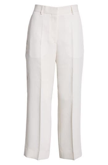 Elin Kling and Karl Lindman bring forth another capsule-wardrobe essential in sharply creased trousers boasting a straight-leg silhouette cropped at the ankle. 24 1/2" inseam; 18" leg opening; 11" front rise; 15" back rise (size 0US/32EU) Zip fly with hook-and-bar closure Side-seam pockets 78% viscose, 22% polyester Dry clean Made in Portugal Designer Clothing White Wide Leg Pants With Pressed Crease For Work, White Pants With Pressed Crease For Work, White Pressed Crease Pants For Work, White Bottoms With Pressed Crease For Spring, White Dress Pants With Pressed Crease For Work, Elegant Cropped Leg Dress Pants For Spring, Elegant Bottoms With Straight Hem For Spring, White Pants With Pressed Crease For Spring, White Spring Pants With Pressed Crease