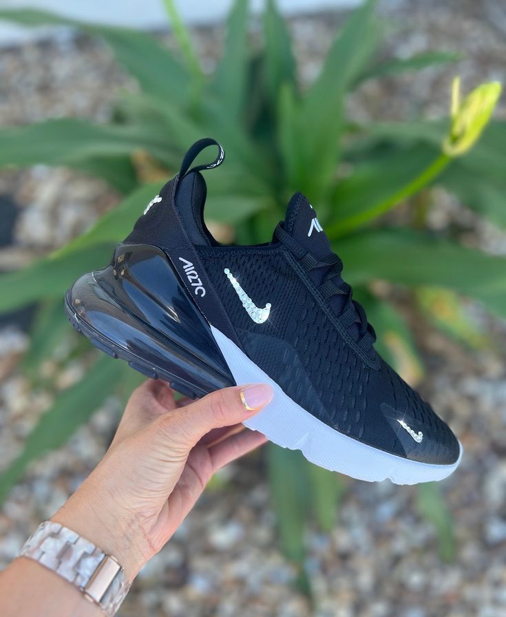 Swarvoski nike blinged air max 270 for women!  Both inner and outer Nike checks blinged and the "AIR" on the backs!  SIZING:  Runs a half size small... or a half size up.  Ex. 8.5 regular orders a 9  COLOR: Black/white  All shoes are 100% authentic and purchased through Nike or an authorized dealer such as: Finish line, Champs, Footlocker.  Crystals are adhered with a high quality permanent gem adhesive. Message me for different colors/styles and questions :)  Happy Shopping! Nike Shoes Women Fashion, Black Nike Air Max, Cute Nike Shoes, Sport Shoes Women, Cute Nikes, Swag Shoes, Nike Air Max 270, Air Max 270, Gym Shoes