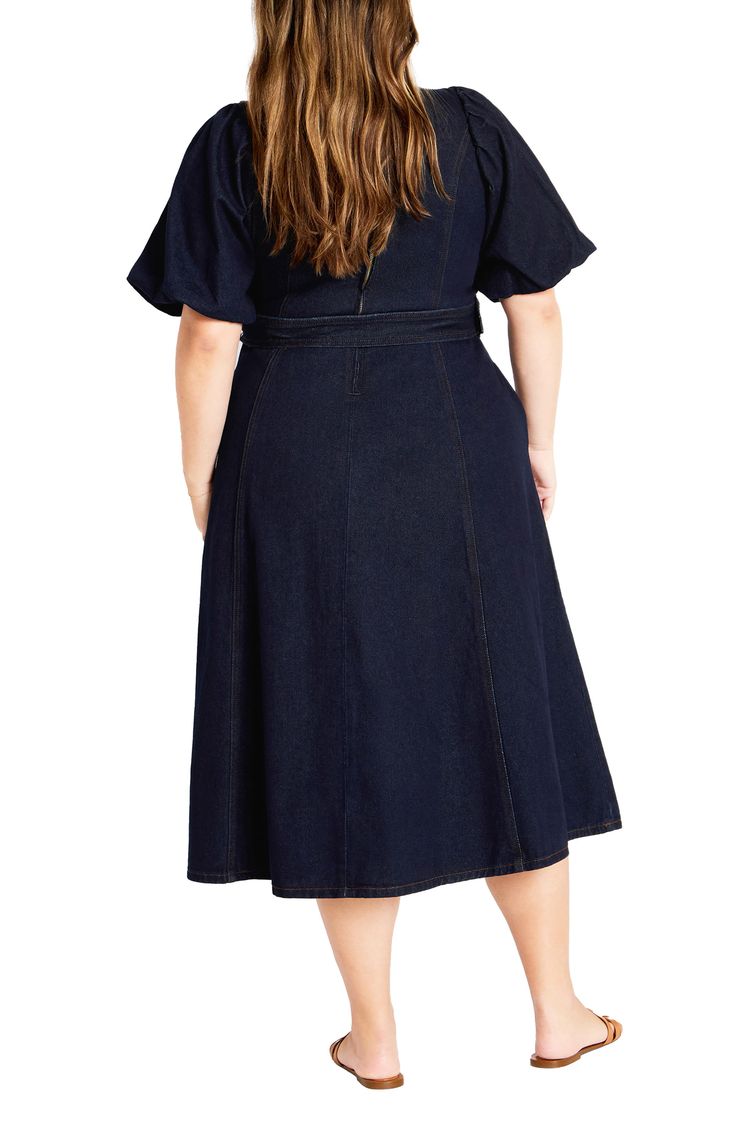 Elevate your office-casual look in this denim midi designed with a belted waist and airy flutter sleeves. 47" length Hidden back-zip closure V-neck Short sleeves Removable belt Unlined 100% cotton Machine wash, line dry Imported Spring Short Sleeve Belted Denim Dress, Chic Denim Blue Short-sleeve Midi Dress, Chic Denim Blue Short Sleeve Midi Dress, Elegant Short Sleeve Denim Workwear Dress, Elegant Short Sleeve Denim Dress For Work, Denim Midi Dress With Short Sleeves For Work, Elegant Belted Denim Dress, Belted Midi Denim Dress For Work, Chic Belted Knee-length Denim Dress