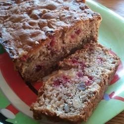 two slices of fruit cake on a plate