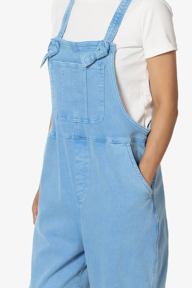 Embrace everyday chic with these denim overalls that blend utility and style. Their adjustable straps and relaxed fit ensure all-day comfort, perfect for casual outings.Made with a soft cotton blend and durable twill, these versatile one-piece jumpsuits are a wardrobe staple for any season.The cropped tapered legs and bib pocket add a contemporary touch to the timeless design, while slant pockets merge convenience with streetwear vibes.Ideal for casual travel, weekend wear, or special occasions, Casual Shortalls With Side Pockets, Spring Medium Wash Overalls With Adjustable Straps, Casual Cotton Shortalls, Casual Relaxed Fit Shortalls, Casual Cotton Overall Shortalls, Relaxed Fit Overalls With Adjustable Straps For Spring, Spring Overalls With Adjustable Straps In Relaxed Fit, Spring Overalls With Adjustable Straps And Relaxed Fit, Trendy Washed Cotton Shortalls