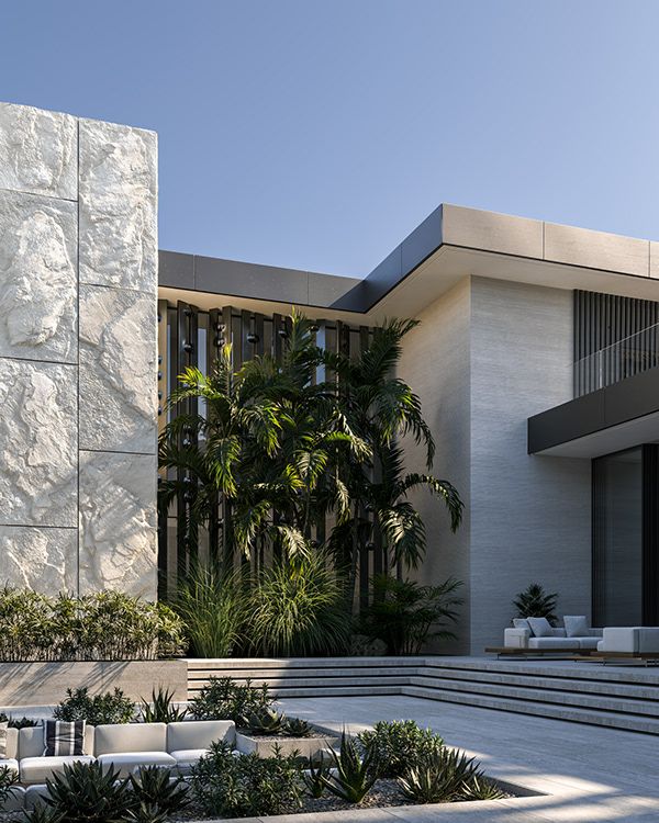 a modern house with concrete steps leading up to it