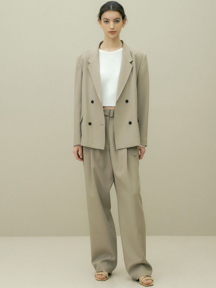 Editor's Notes The tailored jacket has an overall low position and has a casual mood. - Double jacket with a notched lapel- Flap pockets on the front- Casual, elegant moodMeasurements(in.)ONE SIZE- Length (from back center): 26.18 in.- Length (from side neck): 27.56 in.- Shoulder: 16.54 in.- Chest: 21.06 in.- Sleeve Length: 23.43 in.- Sleeve Width: 7.48 in.- Sleeve Hem: 5.71 in.- Bottom Hem: 21.26 in.Model info: Height 5' 7.5'', Waist 24 in., Hip 35 in.Composition & Care- 96% Khaki Single Breasted Blazer For Office, Elegant Khaki Business Casual Outerwear, Elegant Khaki Outerwear For Business Casual, Khaki Blazer For Business Casual In Spring, Fall Khaki Blazer For Business Casual, Elegant Khaki Blazer For Office, Khaki Single Breasted Blazer With Lapel Collar, Khaki Blazer For Spring Business Casual, Khaki Double-breasted Outerwear For Work