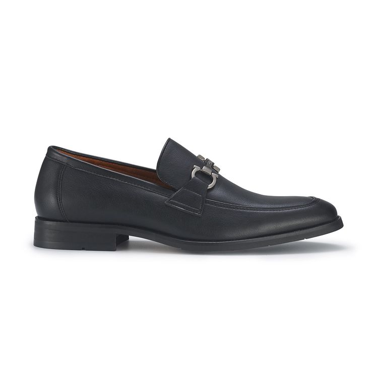 Elevate your style with this classic loafer. Featuring a sleek design and sophisticated metal buckle detail, these loafers provide a perfect blend of classic style and modern comfort. Ideal for both formal occasions and casual outings, these shoes are a versatile addition to any wardrobe. Brand: Ferro Aldo Apron toe loafer with buckle along the top Easy slip-on access Memory foam insoles for added comfort Upper: Synthetic leather Lining: Microfiber Elegant Office Loafers With Metal Pin Buckle, Elegant Workwear Loafers With Metal Pin Buckle, Elegant Loafers With Metal Pin Buckle And Round Toe, Classic Loafers With Metal Pin Buckle For Work, Elegant Loafers With Metal Pin Buckle, Classic Loafers With Metal Pin Buckle For Office, Elegant Slip-on Loafers With Metal Pin Buckle, Elegant Slip-on Loafers With Buckle Closure, Classic Office Loafers With Metal Pin Buckle