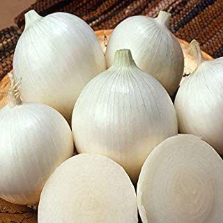 some onions are sitting on a cutting board