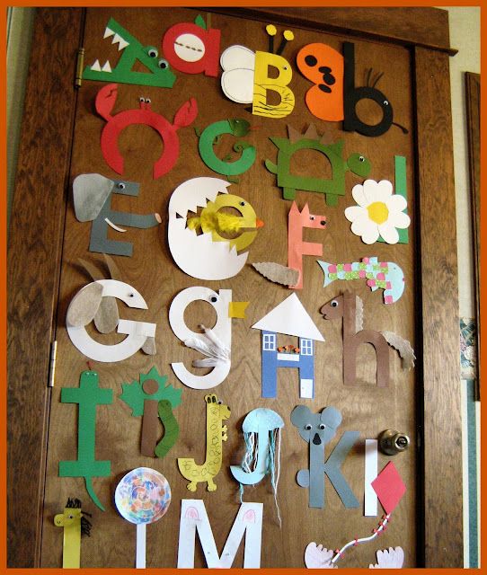 the door is decorated with cut out letters