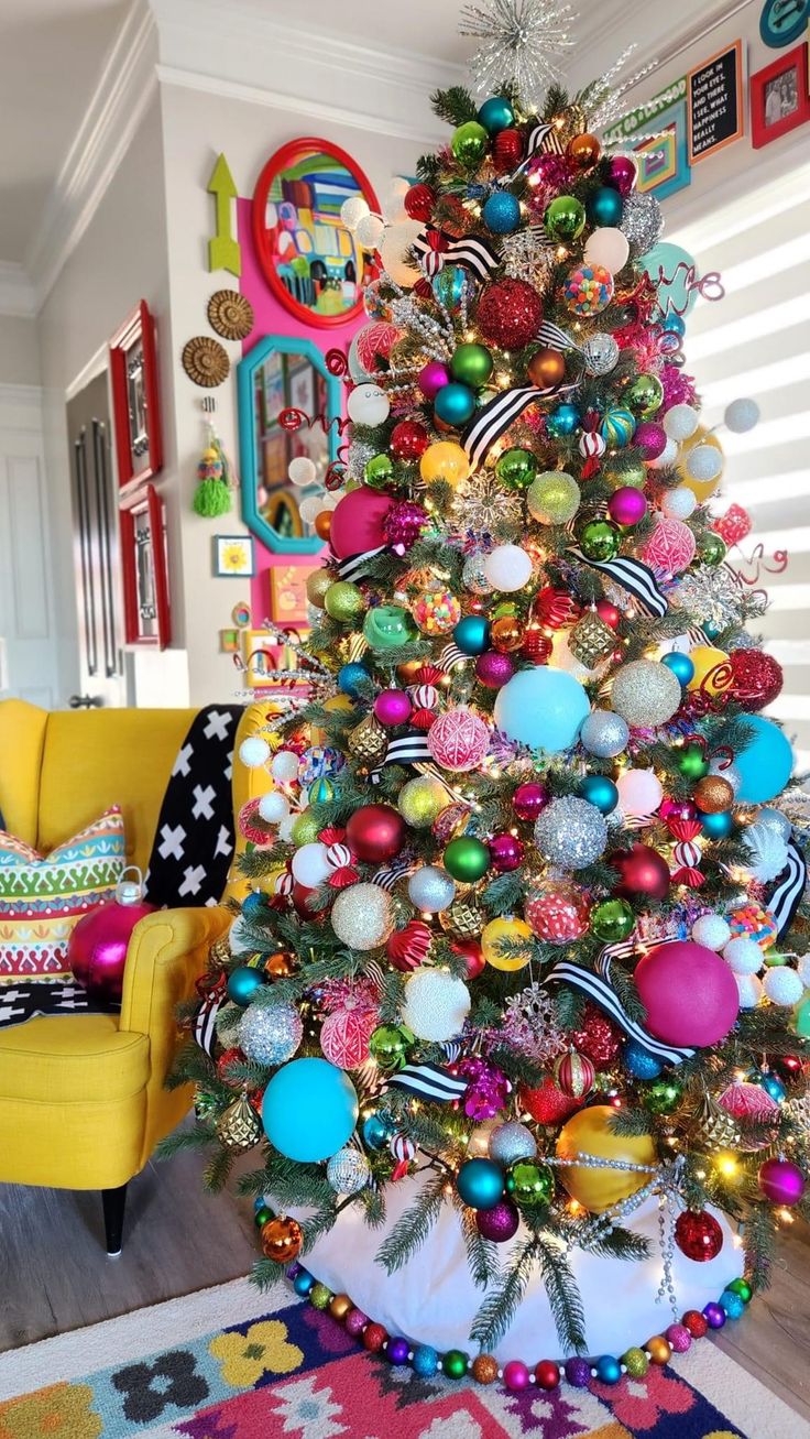 a brightly colored christmas tree in a living room