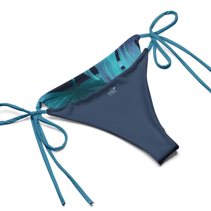 Stay comfortable and beach ready all summer in this FYC String Bikini set. It’s made from soft recycled polyester with double-layering and UPF 50+. Style the straps how you like, and get ready to swim! 🏊‍♀️ 🌟 Features: Soft and stretchy material with UPF 50+ protection. Available in sizes up to 4XL. Bikini top comes with removable padding for comfort. Multiple ways to tie and style the bikini set. 🌊 Disclaimer: To make your All-Over Print Recycled String Bikini last longer, thoroughly rinse i Summer Nylon Swimwear For Surfing, Tropical Nylon Swimwear For Vacation, Tropical Style Nylon Swimwear For Vacation, Adjustable Tropical Swimwear For Pool, Blue Swimwear With Adjustable Straps For Surfing, Adjustable Strap Swimwear For Surfing Beach Season, Adjustable Nylon Swimwear For Sunbathing, Adjustable Straps Swimwear For Surfing And Beach Season, Adjustable Straps Swimwear For Surfing During Beach Season