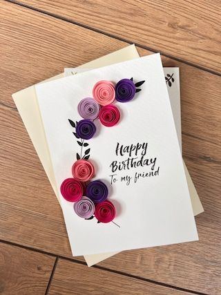 two greeting cards with paper flowers on them, one is happy birthday to my friend