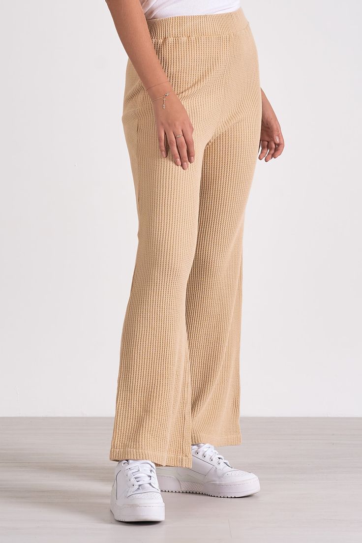 Lounge in luxury with Odie pants. These wide-leg waffle knit trousers merge sweatpant comfort with elevated style for a cozy yet chic look. Denim Dress Fall, Jumpsuit Coverup, Fall Bottoms, Knit Trousers, Jumpsuit Fall, Elevated Style, Cardigan Sweater Dress, Henley Top, Crop Top Sweater