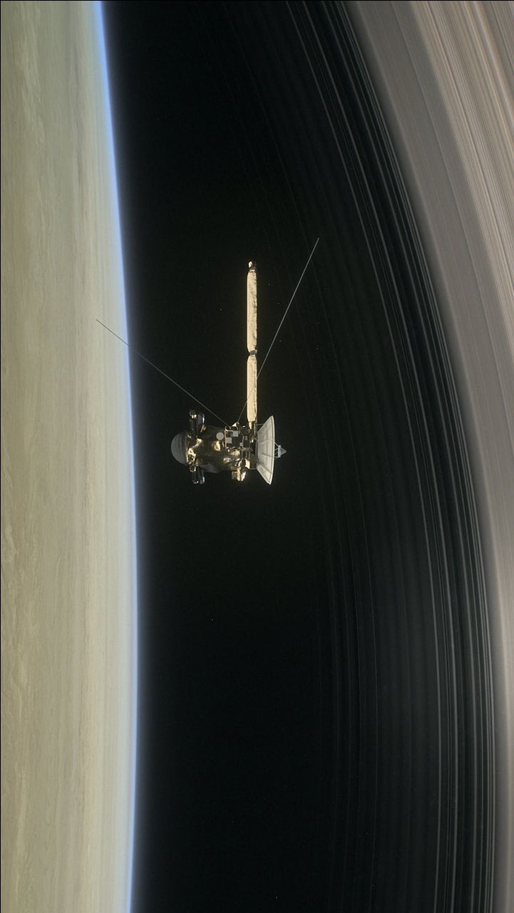 an artist's rendering of the spacecraft approaching saturn