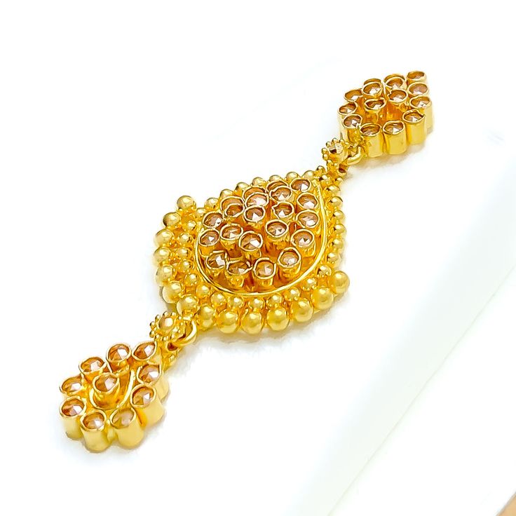 This Graceful Drop 22k Gold Kundan Necklace Set, weighing 51.8 grams, is a stunning fusion of traditional craftsmanship and elegance. Adorned with exquisite Kundan stones, it features a luxurious yellow gold finish. The set has a necklace length of 16 inches, with a drop length of 1.75 inches, and 1.7-inch adjustable links for a customizable fit. A secure hook lock ensures comfortable wear. Matching earrings, each 1.75 inches in length with screw-back posts, complete the set. Ideal for those who Gold Hallmarked Kundan Necklace For Diwali, 22k Yellow Gold Chandbali Kundan Necklace, Yellow Gold Kundan Necklace For Diwali, 22k Gold Round Pendant Necklace For Wedding, Traditional Yellow Gold Pendant Jewelry, Gold Necklace With Meenakari Round Pendant, Gold Meenakari Round Pendant Jewelry, Gold Meenakari Round Pendant Necklace, Gold Meenakari Necklace With Round Pendant